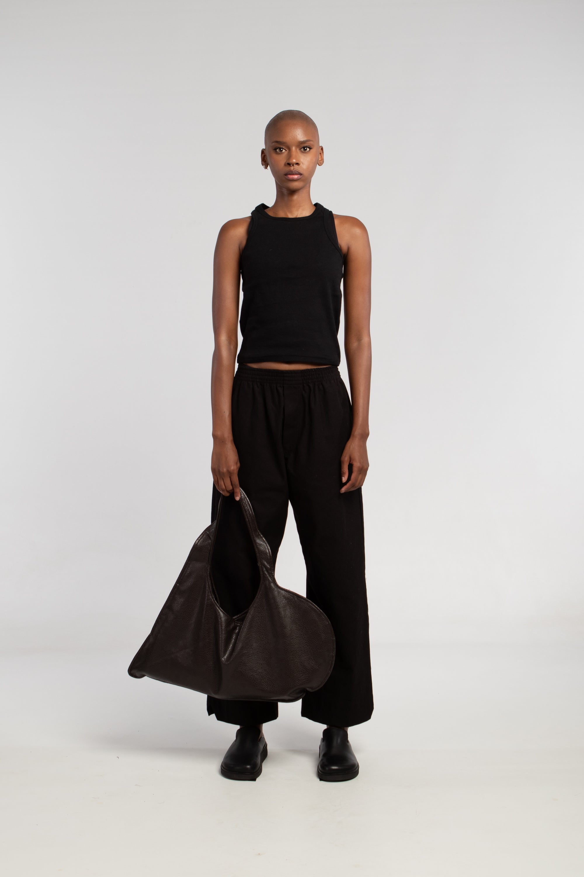 dark brown heart-shaped bag