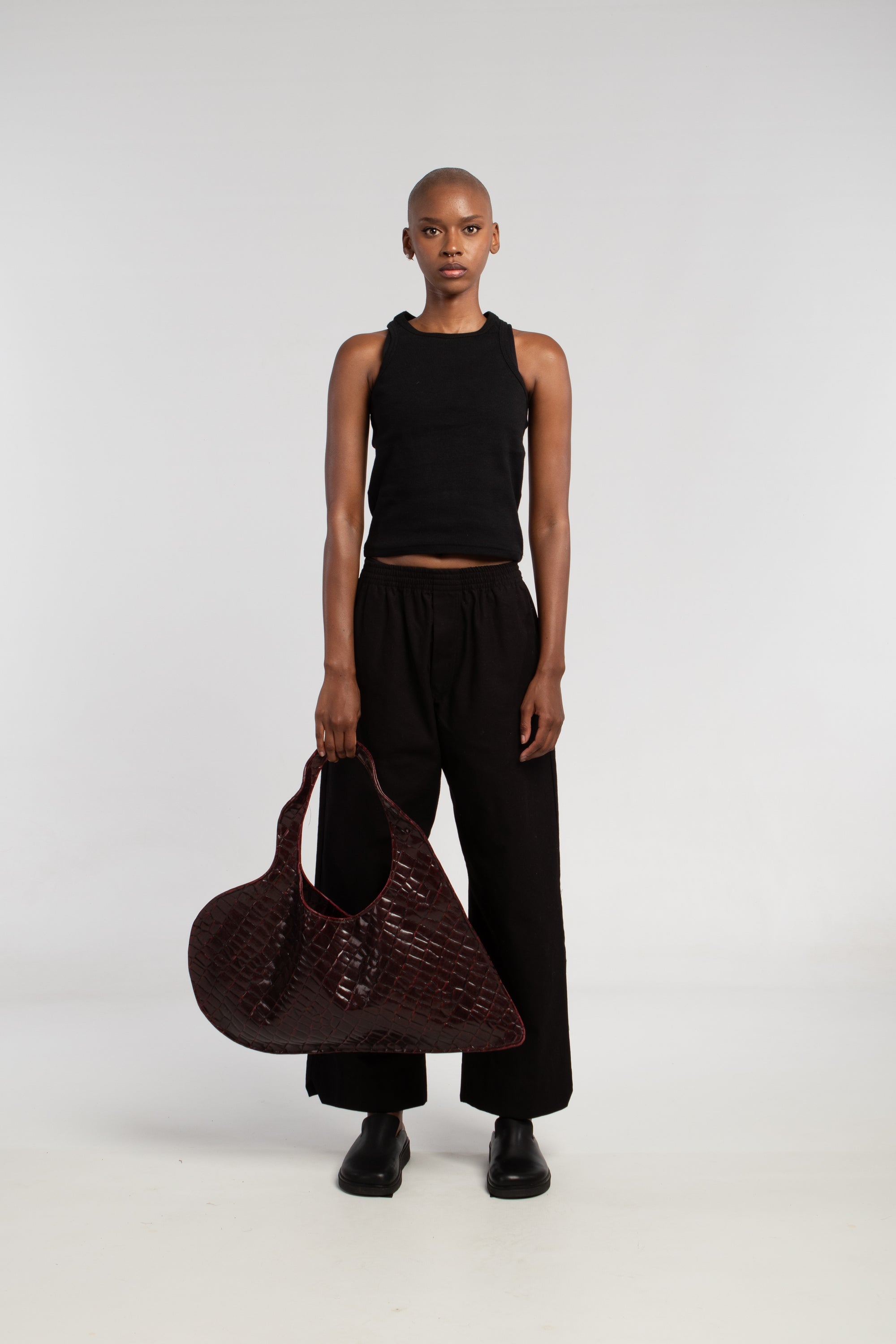 maroon heart-shaped bag